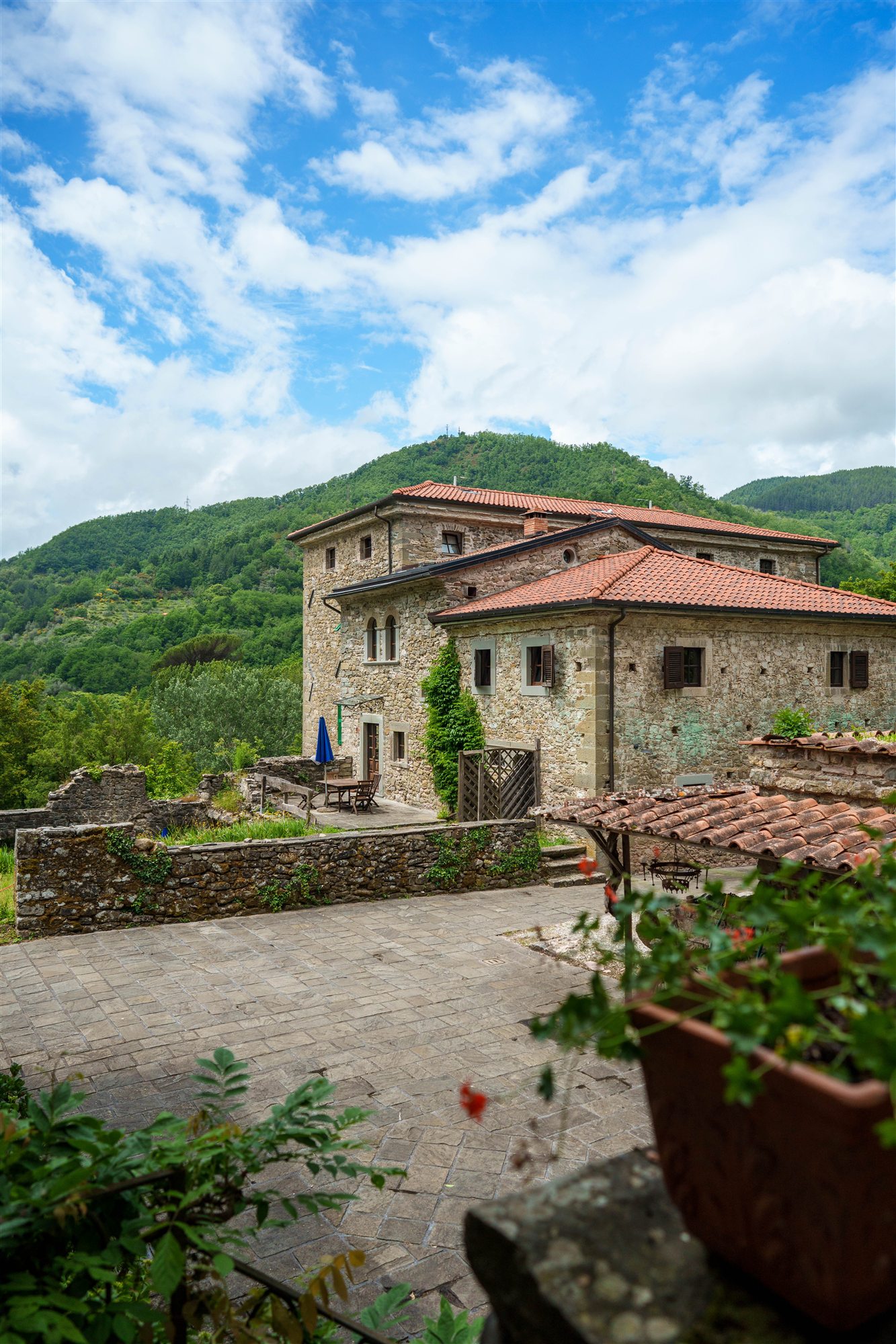 Historic Il Convento among winter hills.